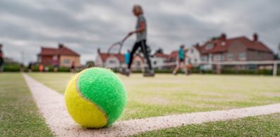 A Tennis Ball on a Tennis Court