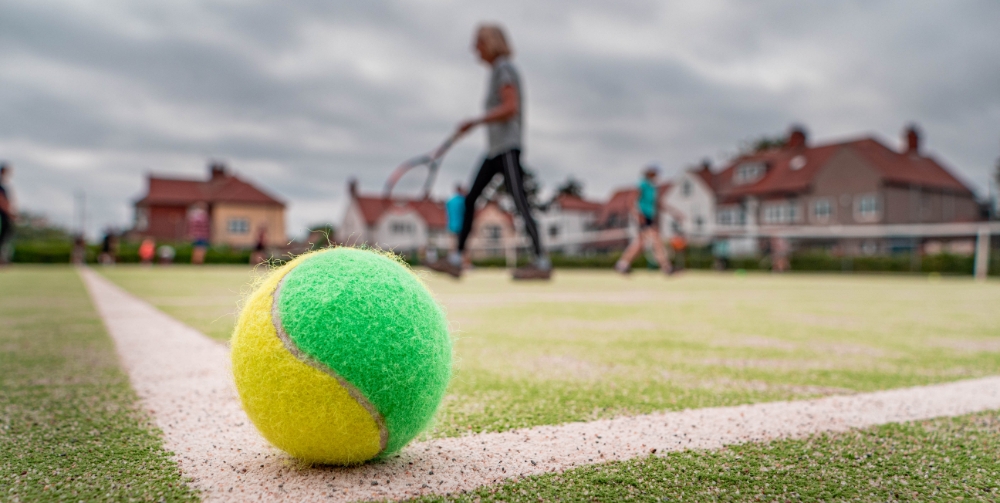 A Tennis Ball on a Tennis Court